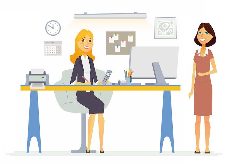 Engaged employees discussing work in an office